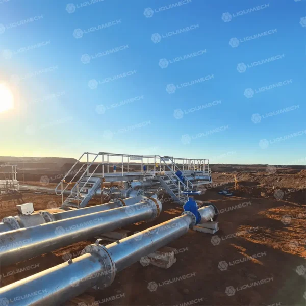 Elevated Liquimech pipe walkway platform enabling workers to safely cross above pipelines and machinery