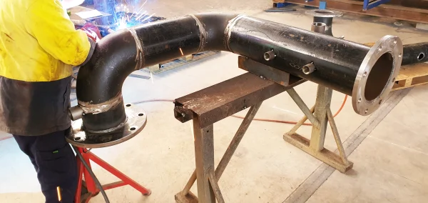Fabrication of prefabricated pipe spools with precision welding techniques
