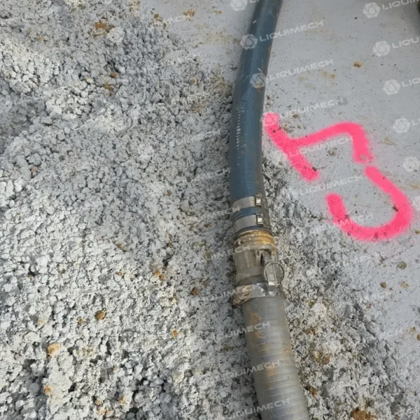 Heavy-duty hosing system in use at the construction site by Liquimech