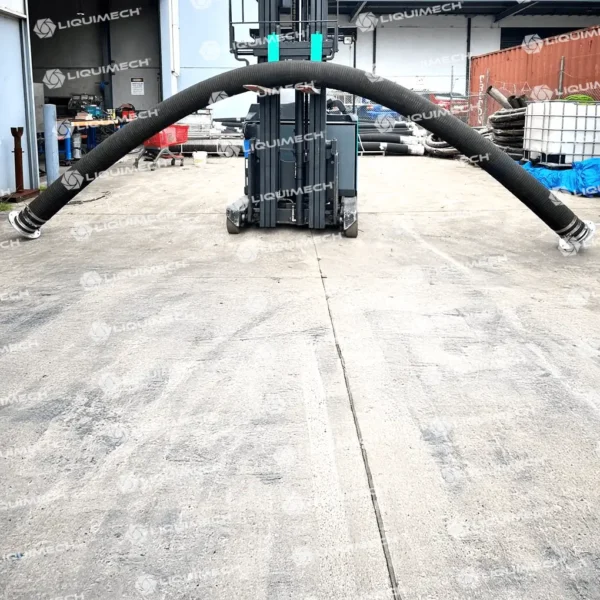 Hose assembly by Liquimech in a forklift, showing durable hydraulic hoses and secure connections for safe fluid transfer and equipment operation on si