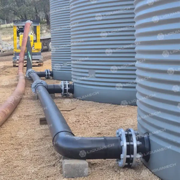 Liquimech pipe spooling and commissioning for poly water tank and pump system