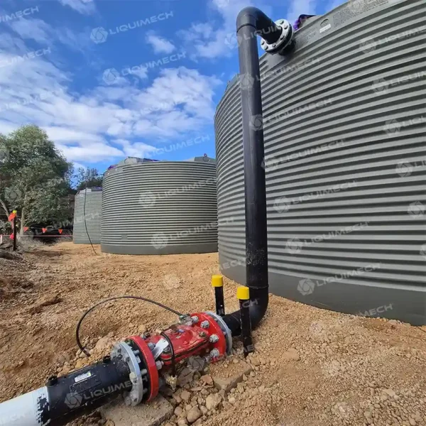 Liquimech pipe spooling commissioning with poly round water tank and water pump
