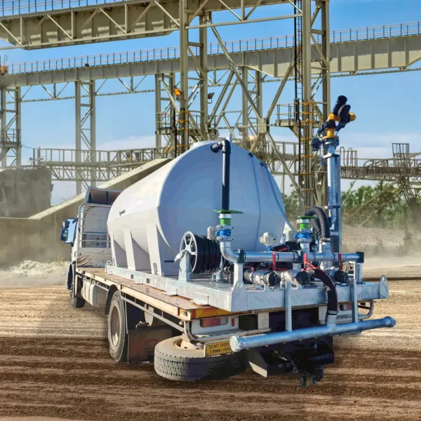 Liquimech slide in water tanks in tipper trucks for construction site dust suppression, with ladder and safety rails