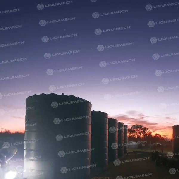 Multiple Liquimech polyethylene potable tanks with built-in pumps for field water management