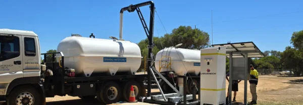 Water cart being filled on-site using a Liquimech water standpipe integrated with web and mobile control software.