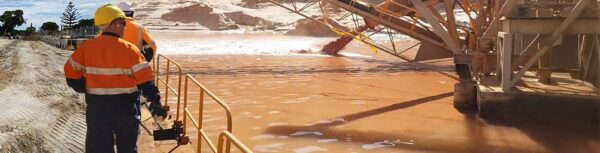 Water removal system designed to separate solids and return cleaner water during mining and construction activities